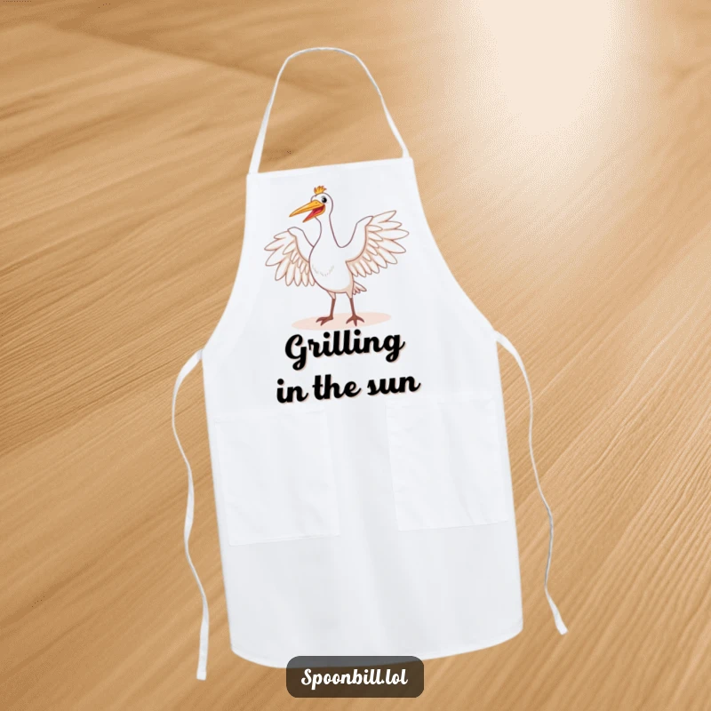 Funny apron featuring a happy spoonbill bird majestically stretching its wings in the sun. Perfect for chefs who enjoy a bit of majestic kitchen humor.