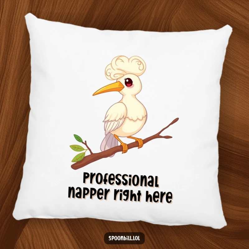 Funny pillow featuring a whimsical spoonbill bird with elaborate curly feathers, humorously balancing on a twig. Soft, decorative, and amusing for any couch.